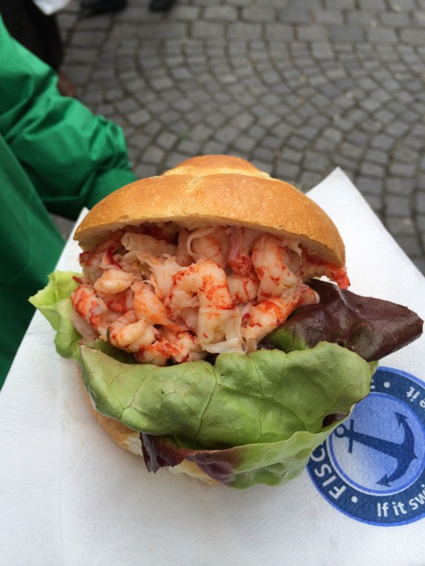 A fresh seafood sandwich from one of the many restaurants in the Viktualienmarkt, a food market that is open every day in the center of Munich. 