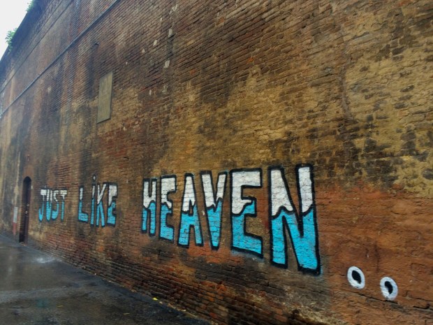 Appropriate street art during a downpour. 