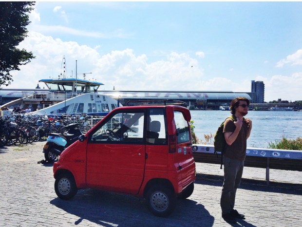 I love these tiny cars. They drive in the bicycle lane!