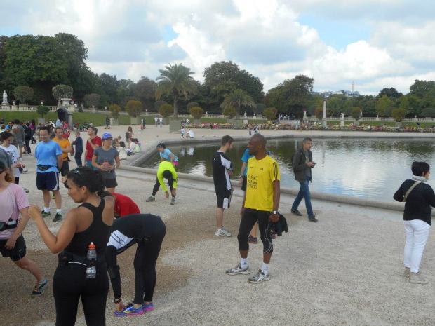 Stretching at the Jardin du Luxembourg after we finished.
