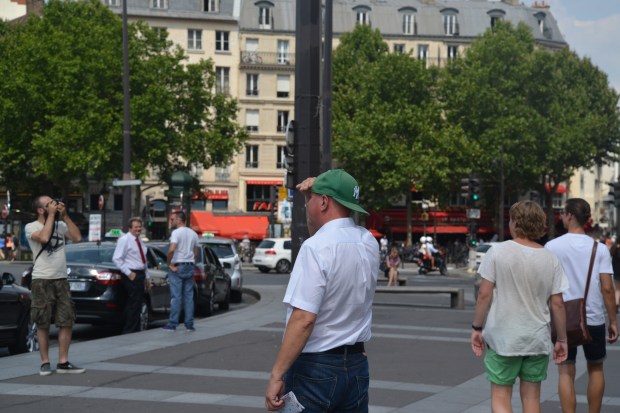 Heh, if only he had a hat to wear that would take care of the bright sun problem. 